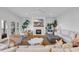 Comfortable living area showcases a fireplace, TV, and ample seating for relaxation and entertainment at 573 S Dunes Dr., Pawleys Island, SC 29585