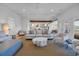 Open-concept living room boasts a spacious layout, modern decor, and seamless flow to other areas at 573 S Dunes Dr., Pawleys Island, SC 29585