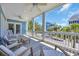 Spacious porch with ceiling fans and comfortable seating area at 573 S Dunes Dr., Pawleys Island, SC 29585