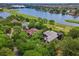 Aerial view of a beautiful luxury home in a waterfront golf course community at 58 Swan Point Trail, Georgetown, SC 29440