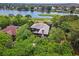 Aerial view of a luxury home with a gorgeous waterfront golf course view at 58 Swan Point Trail, Georgetown, SC 29440
