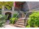 Inviting front entrance featuring a brick staircase, detailed railing and decorative entryway at 58 Swan Point Trail, Georgetown, SC 29440