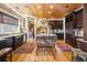 Well-appointed kitchen with wood cabinetry, a center island, and wood floors at 58 Swan Point Trail, Georgetown, SC 29440