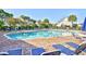 Community pool with lounge chairs and clear blue water for residents to enjoy at 6095 Catalina Dr. # 714, North Myrtle Beach, SC 29582