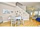 Bright dining area with stylish decor and easy access to the living room, creating an inviting atmosphere at 6095 Catalina Dr. # 714, North Myrtle Beach, SC 29582