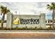 Decorative community entrance sign, with beautiful signage and manicured landscaping at 6095 Catalina Dr. # 714, North Myrtle Beach, SC 29582