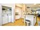 Convenient kitchen layout provides easy access to the laundry area and features counter seating at the breakfast bar at 6095 Catalina Dr. # 714, North Myrtle Beach, SC 29582