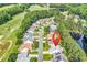 Aerial view of a home nestled in a community with golf course and lake access at 6434 Longwood Dr., Murrells Inlet, SC 29576