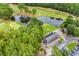 Aerial view of the community clubhouse and parking area, near golf course and pond at 6434 Longwood Dr., Murrells Inlet, SC 29576
