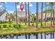 This property boasts a beautiful lake view with a patio perfect for enjoying the outdoors at 6434 Longwood Dr., Murrells Inlet, SC 29576