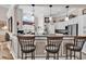 Stylish kitchen showcasing granite counters, a breakfast bar, pendant lighting and views to nook at 6434 Longwood Dr., Murrells Inlet, SC 29576