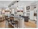Open kitchen featuring granite countertops, stainless appliances, breakfast bar, and eat in nook at 6434 Longwood Dr., Murrells Inlet, SC 29576