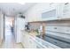 Well-lit kitchen boasting standard appliances, sleek countertops, and ample cabinets at 6900 N Ocean Blvd. # 840, Myrtle Beach, SC 29572