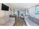 Comfortable living room with stylish sofas, dining table, and inviting decor at 6900 N Ocean Blvd. # 840, Myrtle Beach, SC 29572
