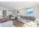 Spacious living room featuring comfortable sofas, dining table, and appealing artwork at 6900 N Ocean Blvd. # 840, Myrtle Beach, SC 29572