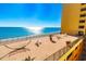 Relaxing ocean view patio showcasing lounge chairs, hammocks, and inviting decor at 6900 N Ocean Blvd. # 840, Myrtle Beach, SC 29572