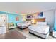 Comfortable bedroom with two beds, soft lighting, and ocean-themed decor at 7200 N Ocean Blvd. # 222, Myrtle Beach, SC 29572