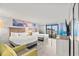 Bright bedroom featuring 2 beds, a dresser, and a beautiful view of the beach at 7200 N Ocean Blvd. # 222, Myrtle Beach, SC 29572