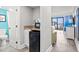 Modern kitchenette with mini-fridge, microwave, and granite countertop at 7200 N Ocean Blvd. # 222, Myrtle Beach, SC 29572