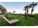 A lush lawn with comfortable lounge chairs for relaxing and enjoying the views at 7200 N Ocean Blvd. # 222, Myrtle Beach, SC 29572