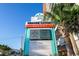 Sign for Grande Cayman Resort with palm trees and beach views at 7200 N Ocean Blvd. # 222, Myrtle Beach, SC 29572