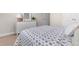 Bedroom featuring a comfortable bed, stylish dresser, and charming decor at 725 Doonbeg Ct., Conway, SC 29526