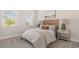 Comfortable bedroom featuring a plush bed with lots of pillows and bedside tables at 729 Doonbeg Ct., Conway, SC 29526