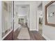 Bright foyer boasts wood-look floors, neutral walls, and views of the living spaces at 733 Doonbeg Ct., Conway, SC 29526