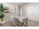 Home office featuring modern desk, neutral paint, closet, and carpeted floor at 733 Doonbeg Ct., Conway, SC 29526