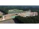 Aerial view of golf course community under construction with new home sites and water features at 741 Doonbeg Ct., Conway, SC 29526