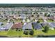 Extensive aerial view of a neighborhood with homes, a waterway, and landscaping at 773 Wintercreeper Dr., Longs, SC 29568