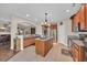 Bright kitchen featuring an island, stainless steel appliances, and granite countertops at 773 Wintercreeper Dr., Longs, SC 29568