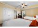 Well-lit bedroom with two beds, connecting to a bathroom and additional sleeping space at 8121 Amalfi Pl. # 4-1006, Myrtle Beach, SC 29572