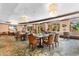 Elegant dining area with large windows and decorative carpet at 8121 Amalfi Pl. # 4-1006, Myrtle Beach, SC 29572
