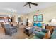 Spacious living area with a dining table, kitchen, comfortable seating, and stylish decor at 8121 Amalfi Pl. # 4-1006, Myrtle Beach, SC 29572