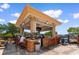 Poolside bar area with plenty of seating at 8121 Amalfi Pl. # 4-1006, Myrtle Beach, SC 29572