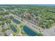 Drone view of a neighborhood near the ocean, with ponds and a main street at 830 44Th Ave. N # T3, Myrtle Beach, SC 29577