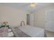 Bedroom featuring a ceiling fan and easy access to the door, providing a relaxing and convenient space at 830 44Th Ave. N # T3, Myrtle Beach, SC 29577