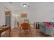 Cozy dining area with wood flooring, room for four, and natural light at 830 44Th Ave. N # T3, Myrtle Beach, SC 29577