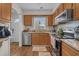 Bright kitchen with stainless steel appliances, and warm wood cabinetry at 830 44Th Ave. N # T3, Myrtle Beach, SC 29577