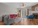Inviting living room features a brick fireplace, hardwood floors, and French doors at 830 44Th Ave. N # T3, Myrtle Beach, SC 29577
