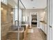 Elegant bathroom offering a soaking tub with shower and vanity with white cabinets at 904 Moultrie Circle, Myrtle Beach, SC 29588