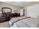 Comfortable bedroom with neutral tones, carpeted floor, and furnishings at 904 Moultrie Circle, Myrtle Beach, SC 29588