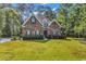Charming brick home with a well-manicured lawn and lush landscaping, exuding curb appeal at 904 Moultrie Circle, Myrtle Beach, SC 29588
