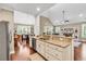 Open kitchen with granite countertops, stainless appliances, and seamless flow to living areas at 904 Moultrie Circle, Myrtle Beach, SC 29588