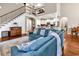 Spacious living room with hardwood floors, soaring ceilings, and staircase with decorative iron railing at 904 Moultrie Circle, Myrtle Beach, SC 29588