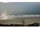 Serene beach view with gentle waves and 'I heart KAT' written in the sand at 9994 Beach Club Dr. # 2402, Myrtle Beach, SC 29572