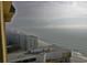 Panoramic ocean view from a high-rise building showcasing the coastline and distant buildings at 9994 Beach Club Dr. # 2402, Myrtle Beach, SC 29572