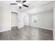Bedroom featuring light gray walls, trim and wood-look floors at 1022 Waccamaw Dr., Conway, SC 29526