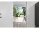 Picture from the doorway out to the deck showing the river and the trees at 1022 Waccamaw Dr., Conway, SC 29526